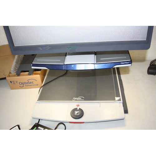 1125 - A TIERMAN GROUP OPTELEC CLEAR VIEW AND MAGNIFIER, used with original packaging, a telescopic stand f... 