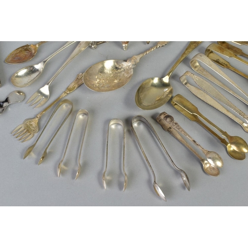 113 - A SELECTION OF WHITE METAL CULTERY, to include a pair of George lll silver engraved sugar tongs, a p... 