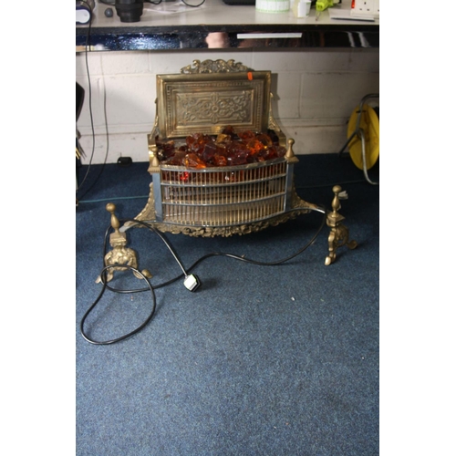 1134 - A BRASS AND STEEL ELECTRIC FIRE, with brass dogs attached and amber coloured coals (PAT pass and wor... 