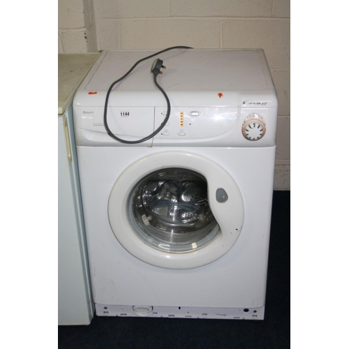 1144 - A CANDY CM462 WASHING MACHINE, (PAT pass and powers up but not checked any further) (missing bottom ... 