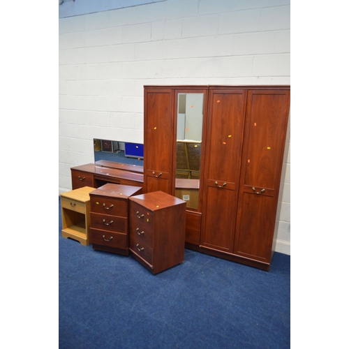 1208 - A MODERN MAHOGANY FINISH FOUR PIECE BEDROOM SUITE, comprising two double door wardrobes, dressing ta... 