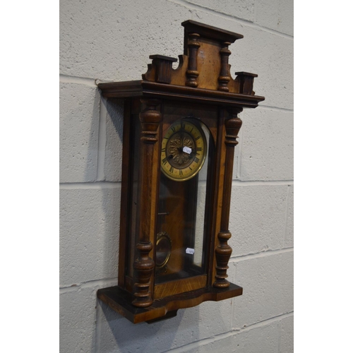 1210 - A LATE 19TH CENTURY WALNUT VIENNA WALL CLOCK (missing finials) (winding key, pendulum)