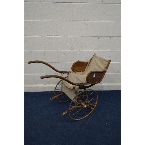 1213 - AN EARLY 20TH CENTURY BEECH CHILDS BENTWOOD RICKSHAW, having a fabric seat and footrest, on twin car... 