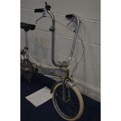 1214 - A BICKERTON PORTABLE ALUMINIUM FOLDING BICYCLE (with original manual)