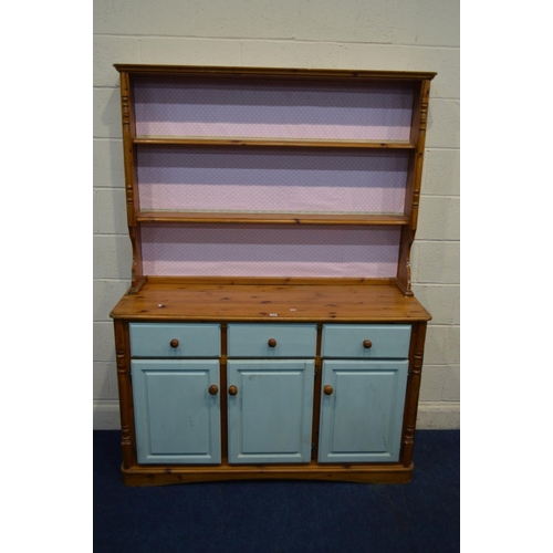 1216 - A MODERN PINE DRESSER with three drawers, approximate width 137cm x depth 46cm x height 183cm (paint... 