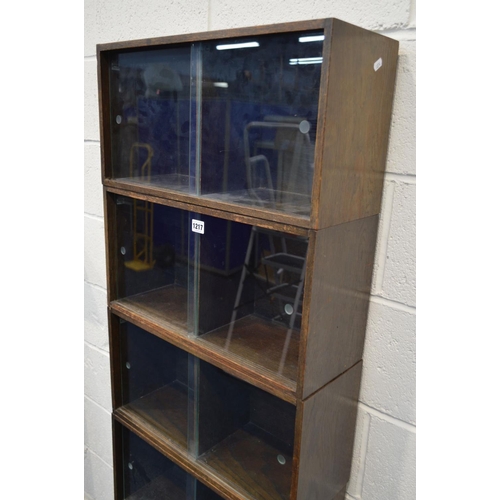 1217 - AN EARLY TO MID 20TH CENTURY UNIX OAK MODULAR SIX SECTION SHELVING UNIT with double sliding glass fr... 