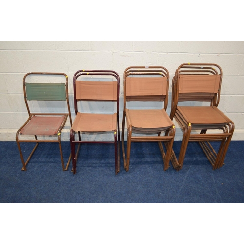 1222 - A SET OF NINE MID CENTURY INDUSTRIAL TUBULAR STACKING CHAIRS with fabric back and seats, seven in or... 