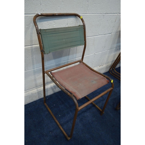 1222 - A SET OF NINE MID CENTURY INDUSTRIAL TUBULAR STACKING CHAIRS with fabric back and seats, seven in or... 