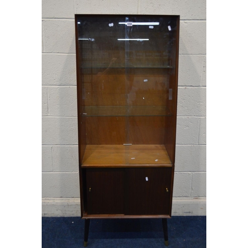 1234 - A TALL 1950'S TEAK DOUBLE GLAZED SLIDING DOOR BOOKCASE, with two glass shelves and double sliding cu... 