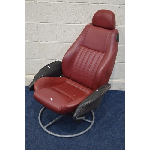 1235 - A RED AND BLACK LEATHER SWIVEL CHAIR, previously a car seat