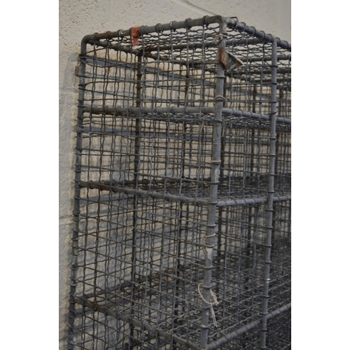 1240 - A GALVANISED STEEL WIRE MESH FRAMED GYMNASIUM NINTY SIX HOLE SHOE RACK, width 122cm x depth 30cm x h... 