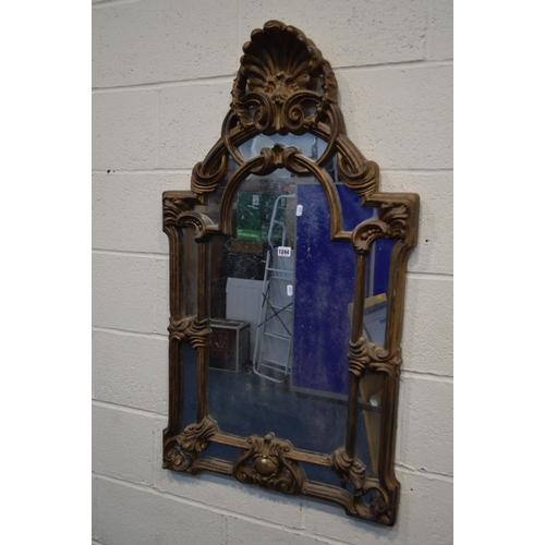 1244 - A MODERN FOLIATE GILT RESIN WALL MIRROR, 64cm x 110cm