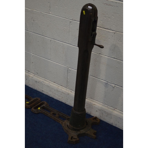 1245 - SLAZENGERS LTD STADIUM POLE, a pair of vintage wooden tennis posts on cast iron bases, approximate h... 