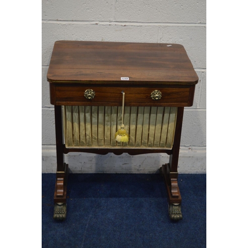 1249 - A REGENCY ROSEWOOD WORK TABLE, rectangular top with rounded corners, and brass banding to edge, with... 