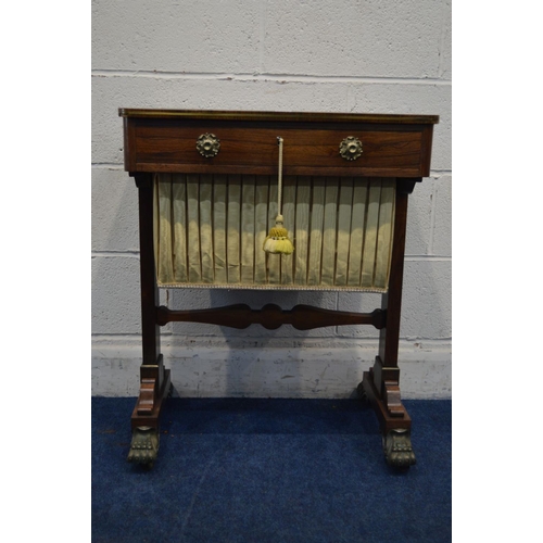 1249 - A REGENCY ROSEWOOD WORK TABLE, rectangular top with rounded corners, and brass banding to edge, with... 