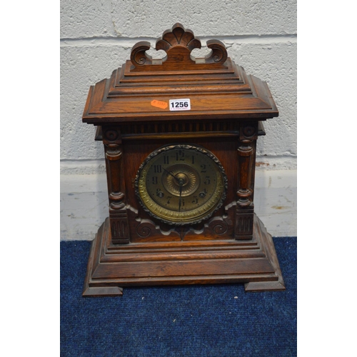 1256 - AN EARLY 20TH CENTURY OAK MANTEL CLOCK, by Ansonia Clock Company (two winding keys)