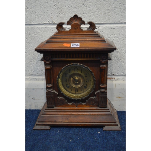 1256 - AN EARLY 20TH CENTURY OAK MANTEL CLOCK, by Ansonia Clock Company (two winding keys)