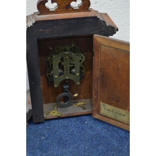 1256 - AN EARLY 20TH CENTURY OAK MANTEL CLOCK, by Ansonia Clock Company (two winding keys)