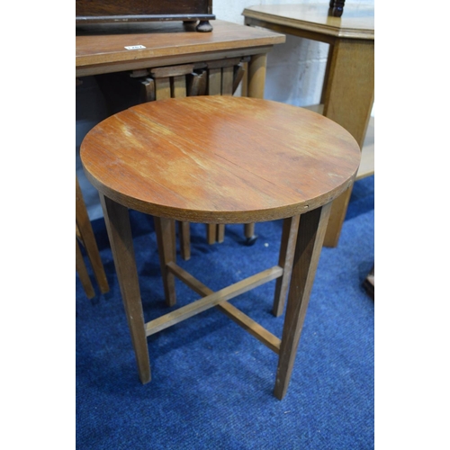 1267 - A MID 20TH CENTURY TEAK COFFEE TABLE, with four circular fold out occasional tables, together with a... 