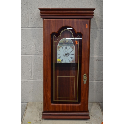 1284 - A MODERN PINE GLAZED CORNER CUPBOARD, together with a mahogany nest of tables, a modern wall clock, ... 