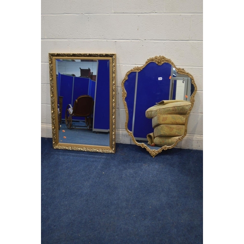 1285 - A FOLIATE GILT FRAMED WALL MIRROR, 69cm x 96cm and another gilt wall mirror (2)