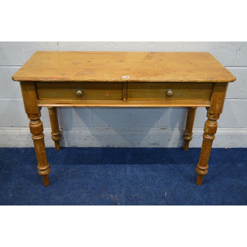 1288 - A VICTORIAN STYLE PINE SIDE TABLE, with two drawers on turned legs, width 107cm x depth 47cm x heigh... 