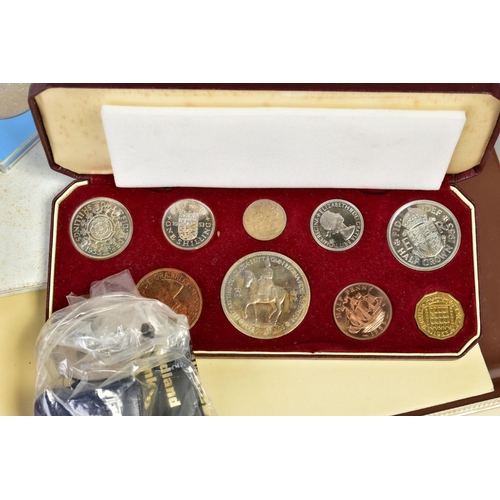 129 - A LARGE BOX OF COINS, to include six UK proof sets, a 1953 specimen set, coin covers, silver proof c... 