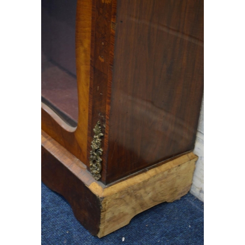 1296 - A LATE 19TH CENTURY WALNUT, ROSEWOOD BANDED AND FOLIATE INLAID GLAZED PIER CABINET, with brass mount... 