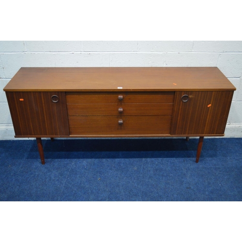 1314 - AN AVALON TEAK SIDEBOARD, with double sliding doors flanking three graduating drawers, approximate w... 