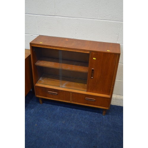 1315 - A MID 20TH CENTURY TEAK GLAZED BOOKCASE, with a single door, above two drawers, approximate width 91... 