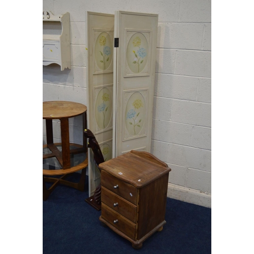 1324 - A PINE THREE DRAWER BEDSIDE CABINET, together with a painted triple floor standing screen, two circu... 