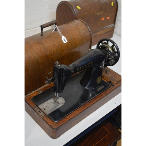 1343 - TWO VINTAGE OAK CASED SINGER SEWING MACHINES, together with a cased Merritt sewing machine and a bra... 