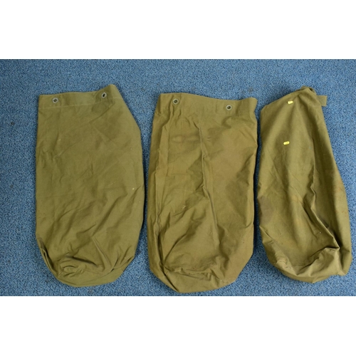 145 - THREE LARGE GREEN CANVAS WWII ERA KIT BAGS, all marked U.S, all in good condition