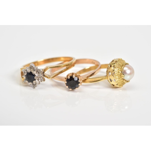 15 - THREE GEM SET RINGS, the first of cluster design set with a central circular cut sapphire with a sin... 