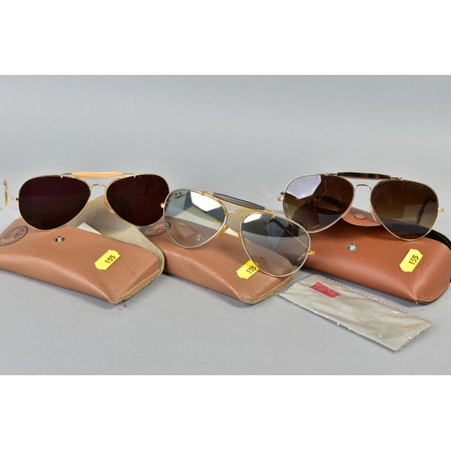 155 - THREE PAIRS OF RAY-BAN SUNGLASSES, all of various glass shades, yellow and mixed colour metals frame... 