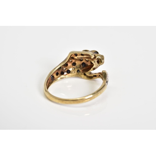 21 - A 9CT GOLD SAPPHIRE AND DIAMOND RING, in the form of a leopard with the body set with circular cut s... 