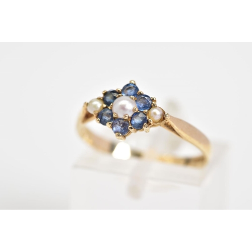 34 - A 9CT GOLD CLUSTER RING, set with a central cultured seed pearl, with a circular cut sapphire surrou... 