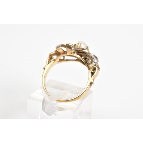 35 - A 9CT GOLD PEARL AND DIAMOND RING, set with a central single cultured pearl with a metal openwork de... 