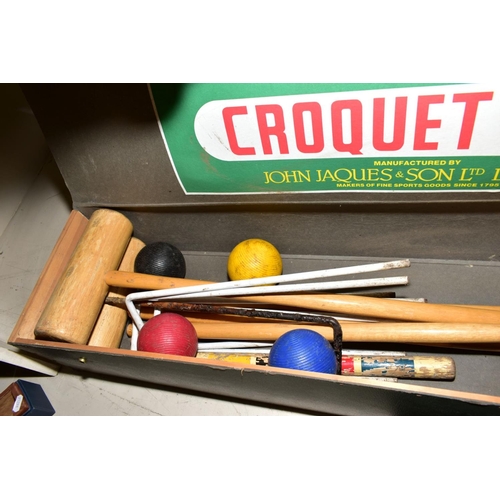 361 - A WOODEN AND CARD CASED JOHN JAQUES & SON LTD CROQUET SET, together with seven tennis racquets, Dunl... 