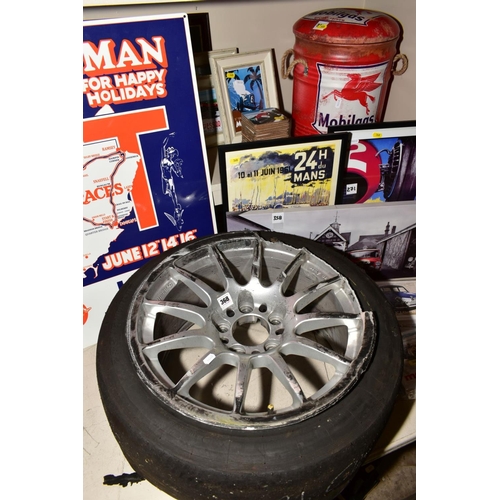 368 - A BRITISH TOURING CAR INTEREST, damaged rally car alloy and tyre, a quantity of modern rally and rac... 