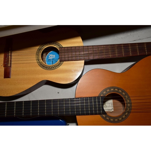 377 - TWO STUDENT CLASSICAL GUITARS AND A STRAT TYPE GUITAR, comprising a BM Classico, an Encore RCG50N an... 