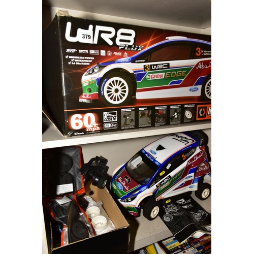 379 - THREE BOXED REMOTE CONTROL VEHICLES, comprising an hpi: racing WR8 Flux Ford Fiesta RS WRC, with som... 