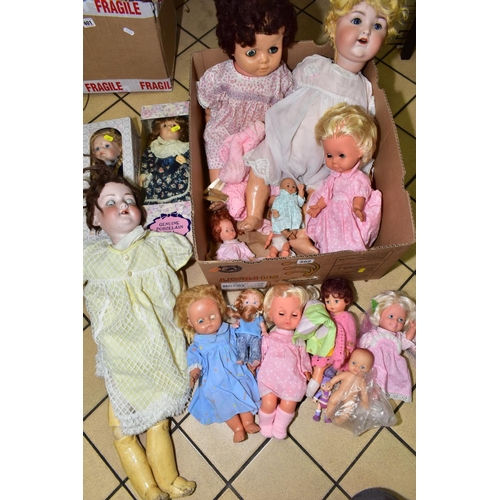 402 - A COLLECTION OF VARIOUS DOLLS, to include two distressed Armand Marsielle dolls, No390, A9M and No99... 