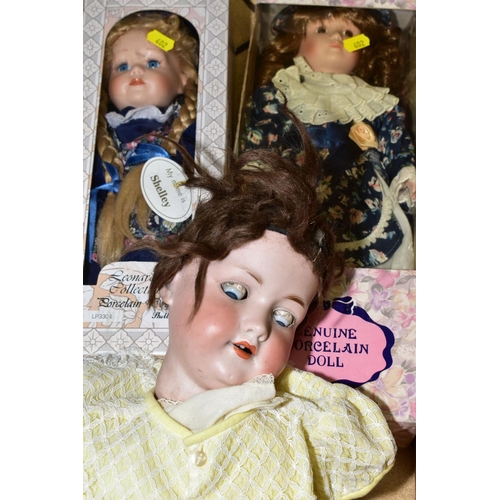 402 - A COLLECTION OF VARIOUS DOLLS, to include two distressed Armand Marsielle dolls, No390, A9M and No99... 