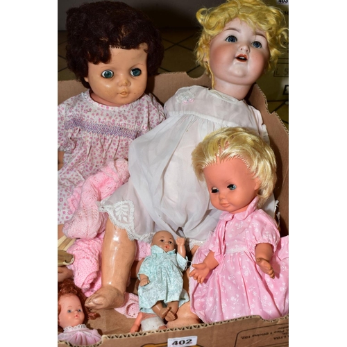 402 - A COLLECTION OF VARIOUS DOLLS, to include two distressed Armand Marsielle dolls, No390, A9M and No99... 