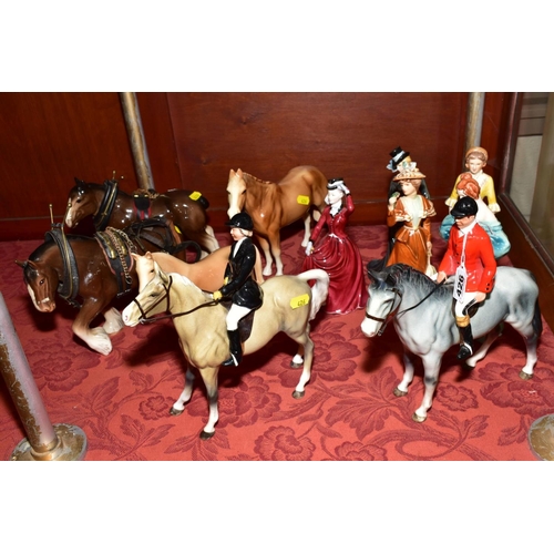 426 - A GROUP OF CERAMIC FIGURES, HORSES, etc to include a Huntsman and Huntswoman (no markings), tallest ... 