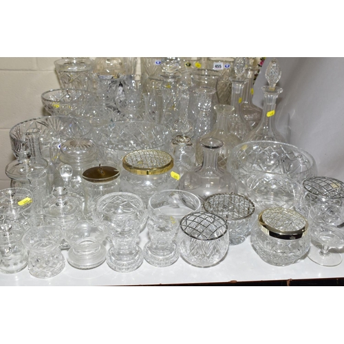 455 - A QUANTITY OF CUT GLASS VASES, BOWLS, DECANTERS, etc, to include Tutbury Crystal, etc