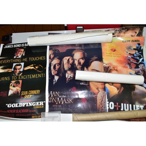 477 - A COLLECTION OF FILM ADVERTISING POSTERS, circa 1980's/1990's, to include Scrooged, three Fugtives, ... 