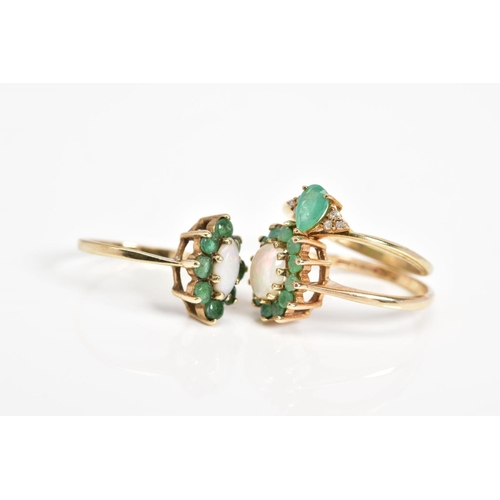 50 - THREE 9CT GOLD EMERALD SET RINGS, the first of cluster design set with an oval cut opal and circular... 