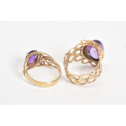 51 - TWO 9CT GOLD AMETHYST RINGS, the first designed with an oval cut amethyst and textured open work scr... 